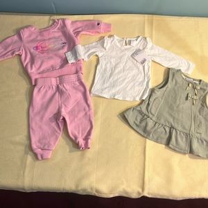 2 outfits for babygirl one sweatsuit pink 6 to 9 months and olive green dress